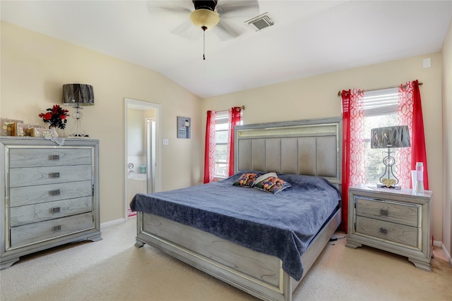 bedroom with multiple windows, ceiling fan, light colored carpet, and lofted ceiling