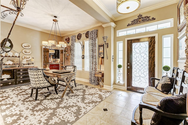 foyer featuring crown molding