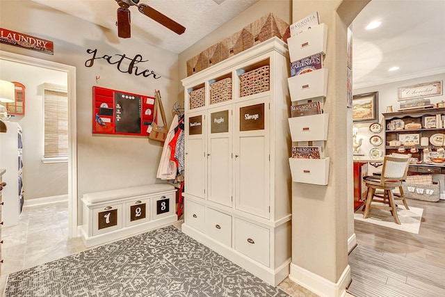 mudroom featuring crown molding, baseboards, a ceiling fan, and recessed lighting