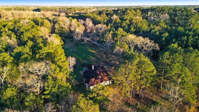 drone / aerial view with a view of trees