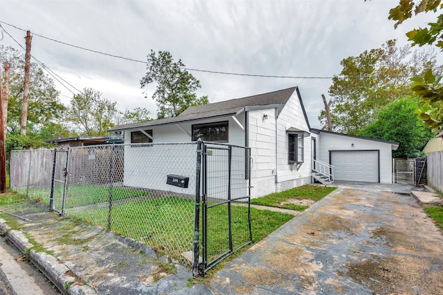 view of side of home featuring a garage and a yard