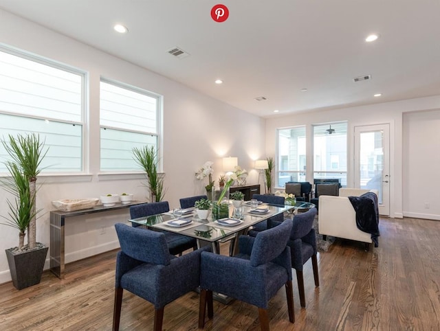 dining room with hardwood / wood-style floors