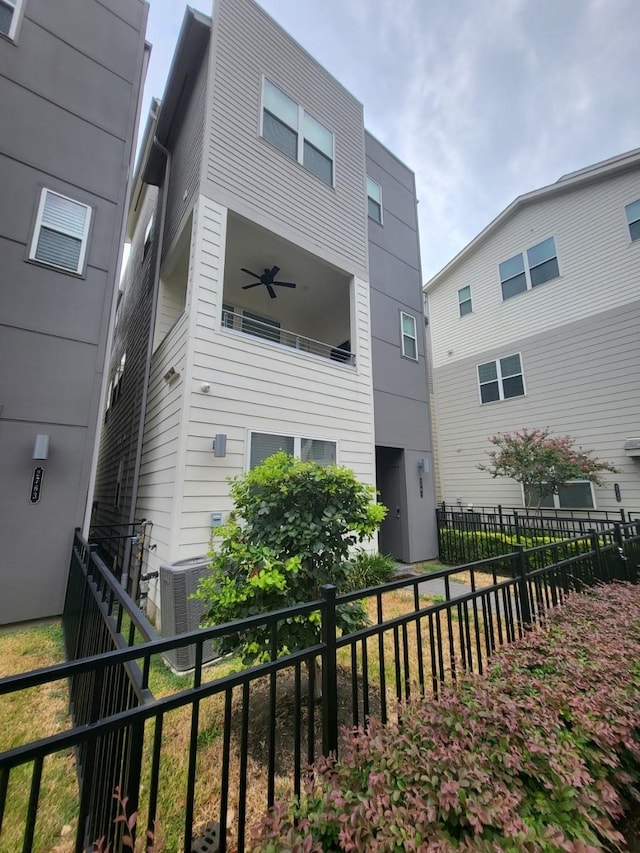 view of property featuring central air condition unit