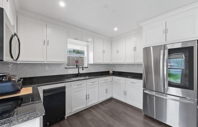 kitchen with dark wood-type flooring, white cabinetry, sink, and stainless steel appliances