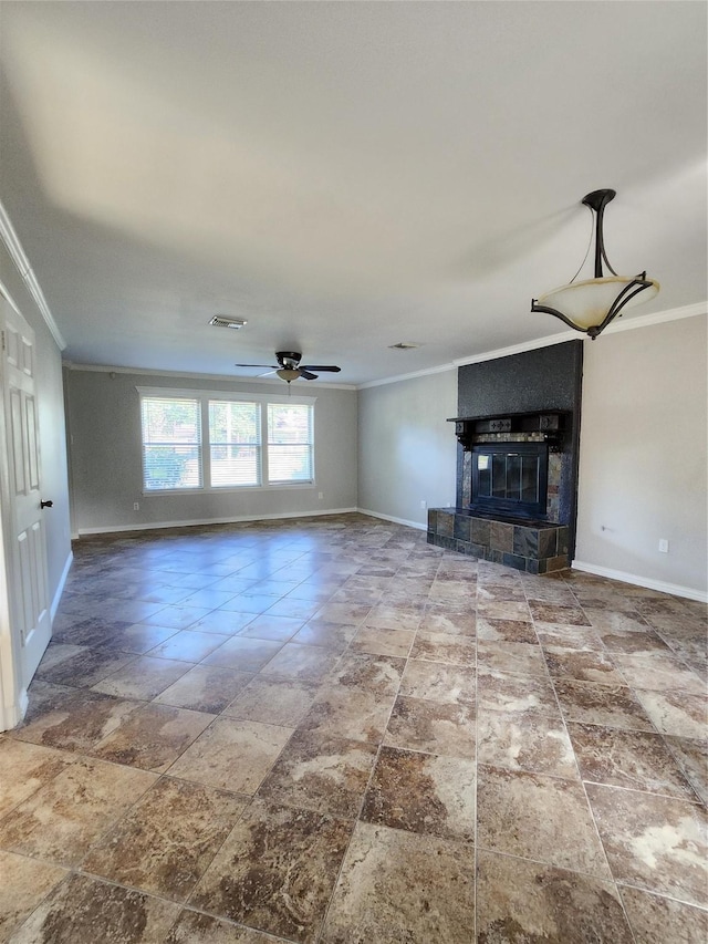 unfurnished living room featuring a fireplace, ceiling fan, and crown molding