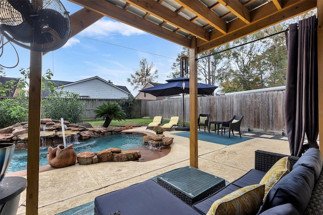 view of swimming pool with pool water feature, an outdoor hangout area, and a patio