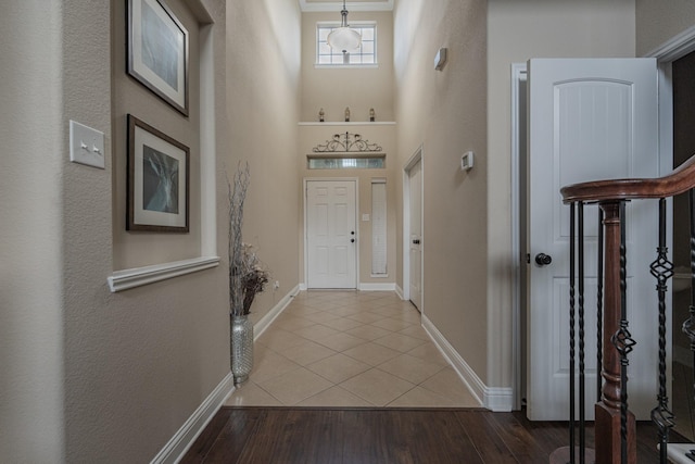 interior space featuring crown molding and hardwood / wood-style flooring