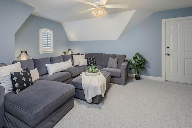 living room featuring carpet, ceiling fan, and lofted ceiling