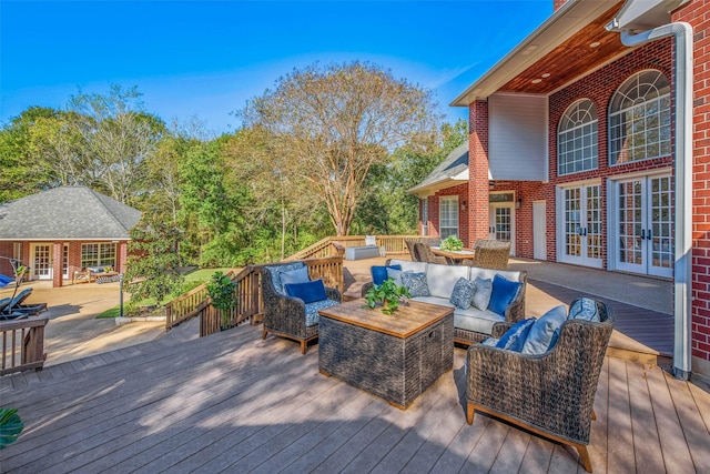 deck with an outdoor hangout area and french doors