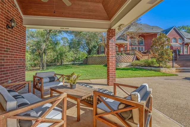 view of patio with outdoor lounge area and ceiling fan