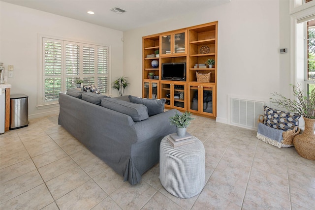 living room featuring light tile patterned floors