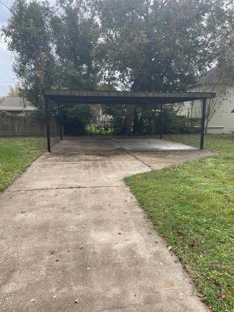 view of yard featuring a carport