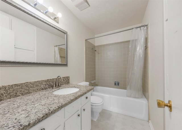 full bathroom featuring vanity, toilet, and shower / tub combo