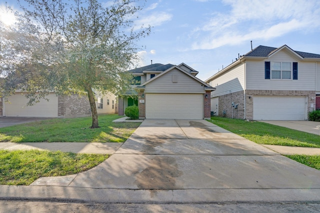 view of front of house featuring a front lawn and a garage