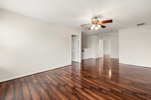 empty room featuring dark hardwood / wood-style floors