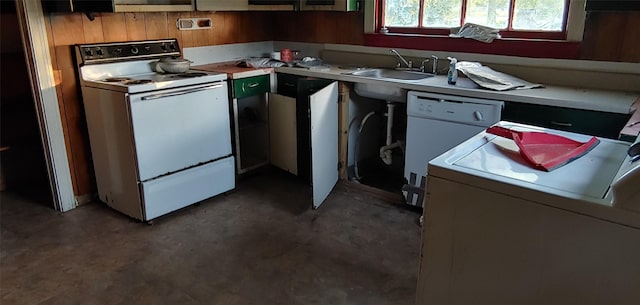 kitchen with washer / clothes dryer, sink, and white appliances