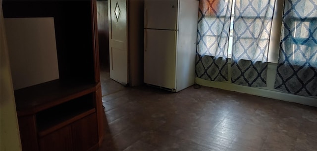1370 Plum St, Beaumont, TX 77703 - unfurnished dining area with tile patterned floors