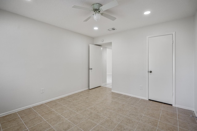 unfurnished bedroom with a closet and ceiling fan