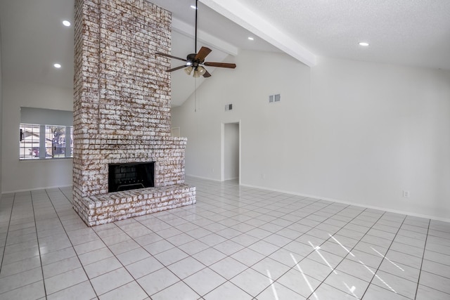 unfurnished living room featuring a fireplace, light tile patterned floors, high vaulted ceiling, and ceiling fan