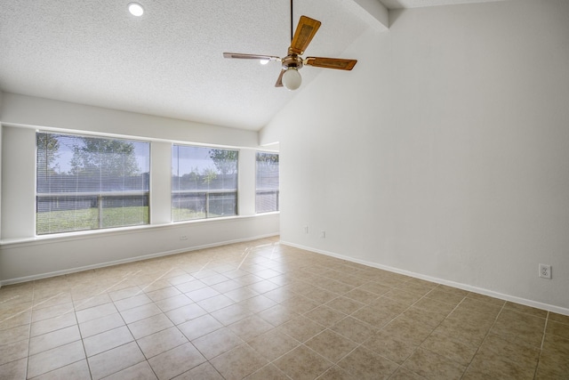 unfurnished room featuring vaulted ceiling with beams, ceiling fan, light tile patterned floors, and a textured ceiling