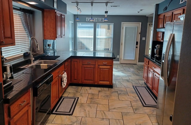 kitchen with sink, black dishwasher, stainless steel refrigerator with ice dispenser, kitchen peninsula, and pendant lighting