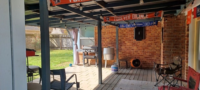 exterior space with a pergola and area for grilling