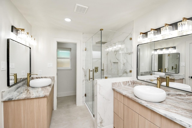 bathroom with vanity and walk in shower