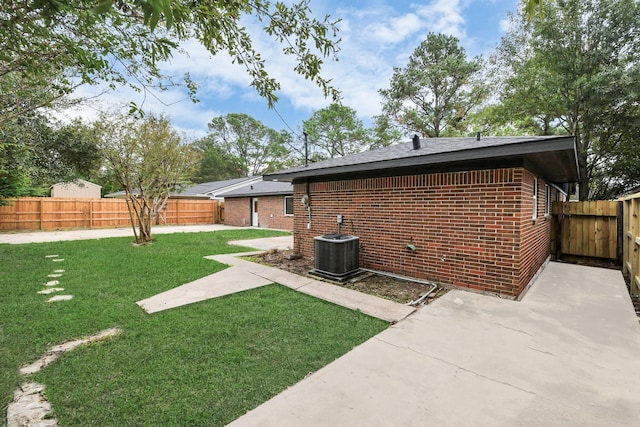 view of yard featuring a patio area and cooling unit