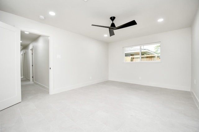 empty room featuring ceiling fan