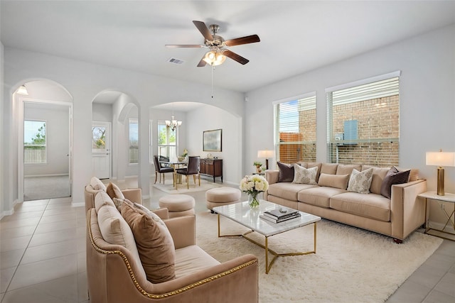 living room featuring light tile patterned floors and a wealth of natural light