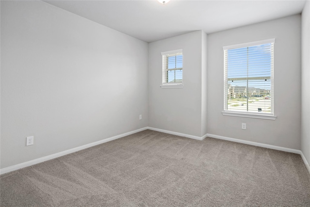 spare room with carpet flooring