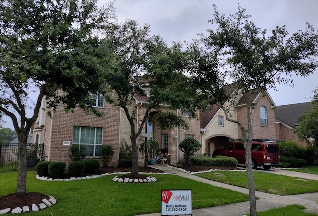 view of front facade with a front lawn