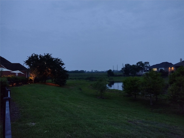 view of yard featuring a water view