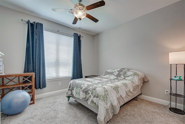 carpeted bedroom with ceiling fan