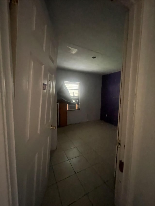 corridor with tile patterned floors