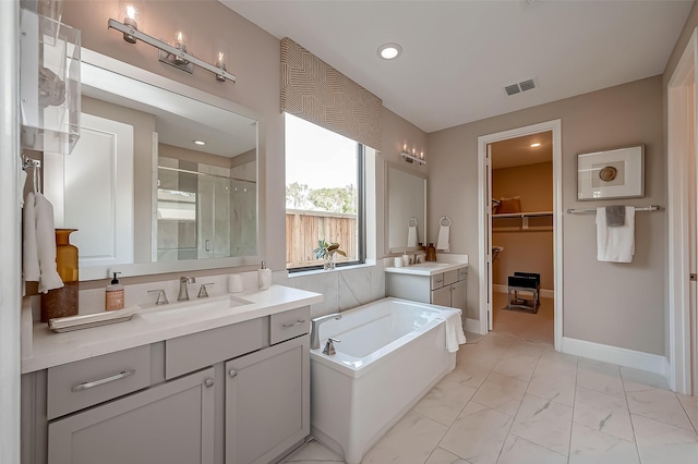 bathroom with vanity and plus walk in shower