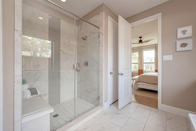 bathroom with ceiling fan and walk in shower