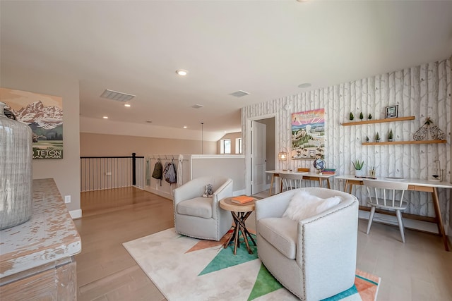 living room with light hardwood / wood-style floors