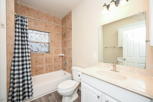 full bathroom with vanity, toilet, wood-type flooring, and shower / tub combo with curtain