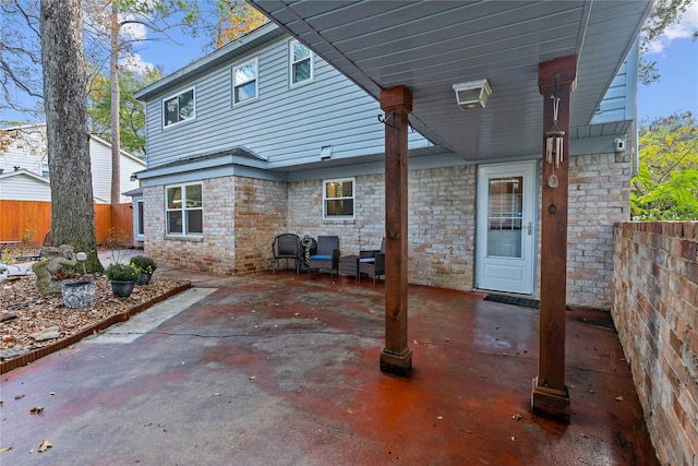 rear view of house with a patio area