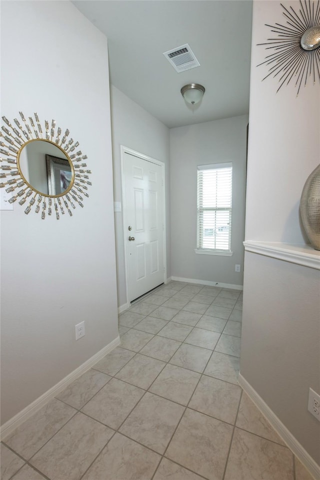 interior space with light tile patterned flooring