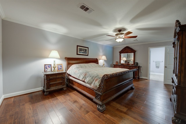 bedroom with ceiling fan, ornamental molding, and dark wood-type flooring