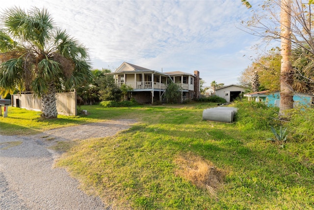 view of front of house featuring a porch and a front lawn