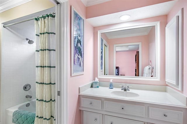 bathroom featuring vanity and shower / bath combo with shower curtain