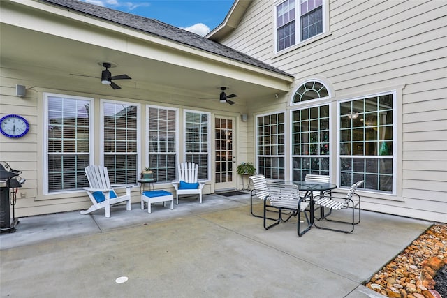 view of patio featuring a grill and ceiling fan