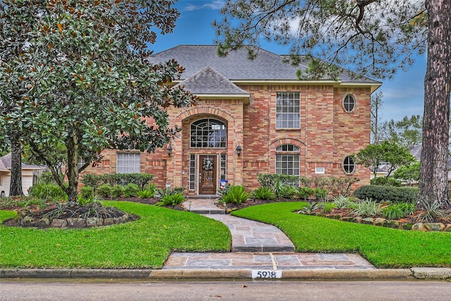 view of front of house with a front yard