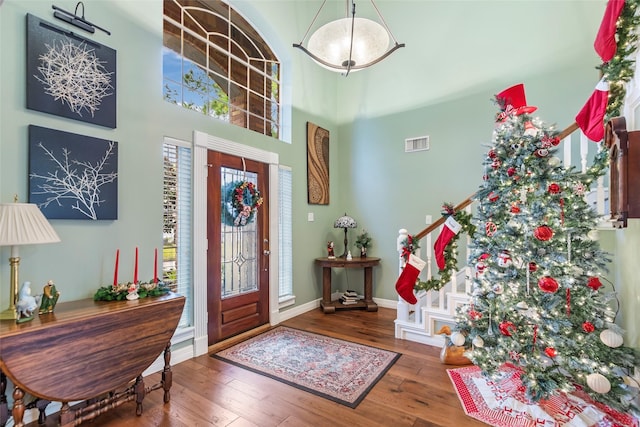 foyer entrance with hardwood / wood-style floors