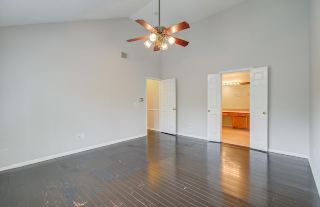 unfurnished bedroom featuring ceiling fan, high vaulted ceiling, and dark hardwood / wood-style floors