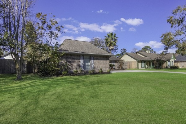 view of front of property with a front lawn