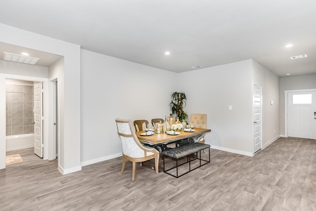 dining room featuring light hardwood / wood-style floors